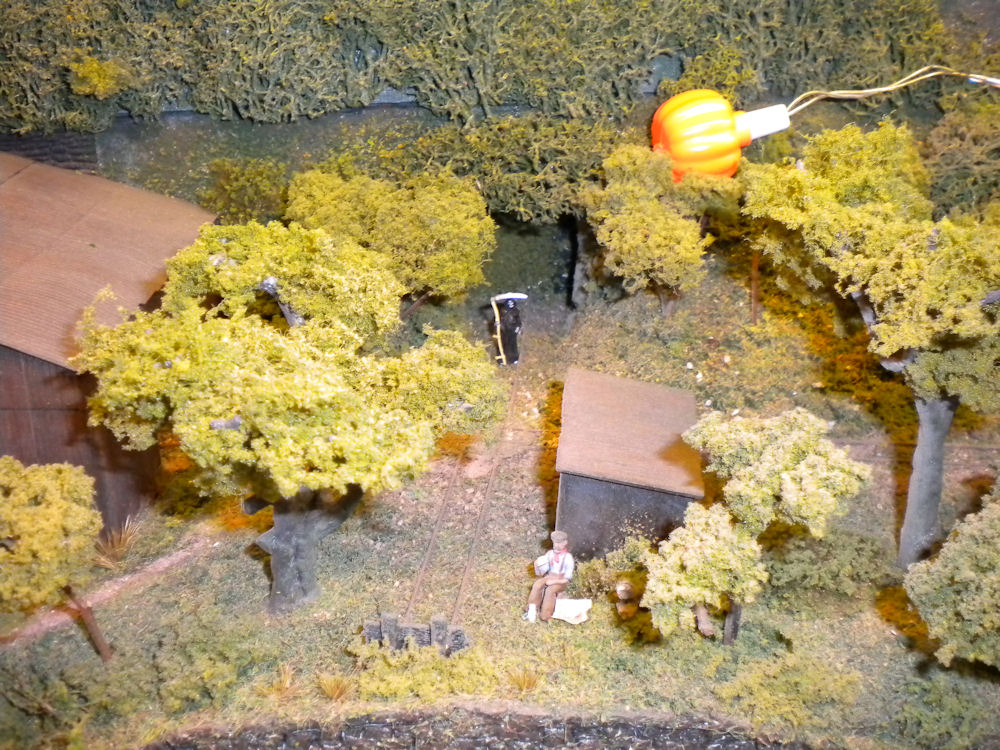 Grim reaper at mine entrance